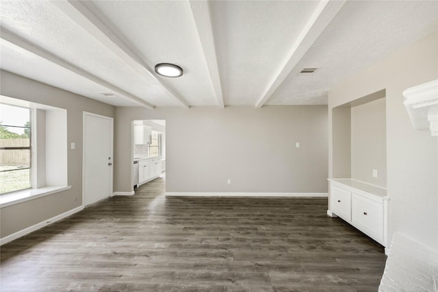 9627 Crooked Wood Ln, Houston, TX 77086 - unfurnished living room with baseboards and dark wood-type flooring