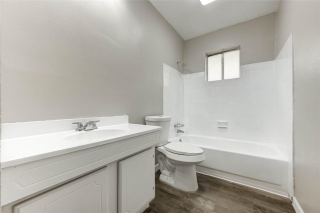 9627 Crooked Wood Ln, Houston, TX 77086 - full bath featuring toilet, wood finished floors, vanity, and shower / bathtub combination