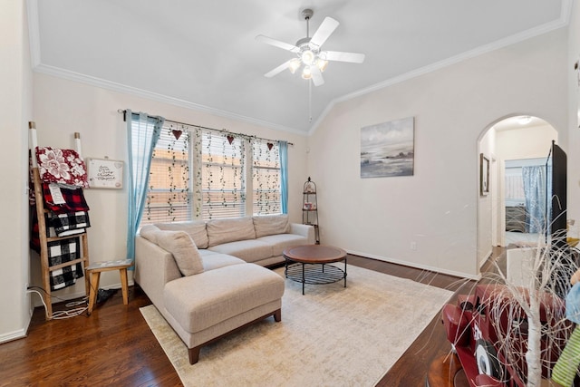2816 Sand Dune Dr, Seabrook, TX 77586 - living room featuring arched walkways, lofted ceiling, crown molding, dark wood finished floors, and healthy amount of natural light