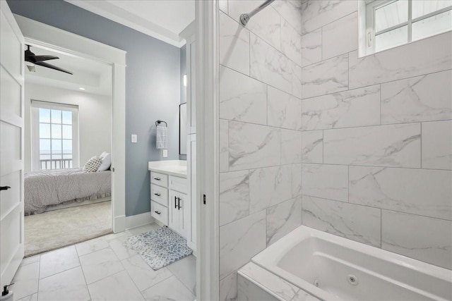 111 Poncho St, Anahuac, TX 77514 - ensuite bathroom featuring marble look tile flooring, vanity, a combined bath / shower with jetted tub, and baseboards