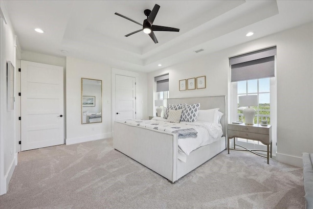 111 Poncho St, Anahuac, TX 77514 - bedroom featuring carpet floors, a tray ceiling, recessed lighting, and baseboards