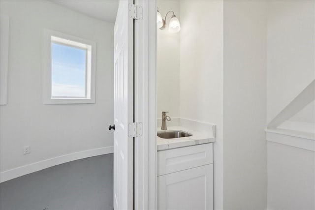 111 Poncho St, Anahuac, TX 77514 - bathroom featuring vanity and baseboards