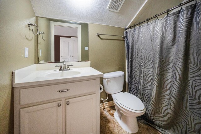 5925 Oak Leaf Ct, Conroe, TX 77304 - full bathroom with toilet, vanity, lofted ceiling, a textured ceiling, and a textured wall