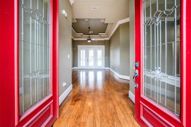 5925 Oak Leaf Ct, Conroe, TX 77304 - entryway with crown molding, french doors, wood finished floors, a tray ceiling, and baseboards