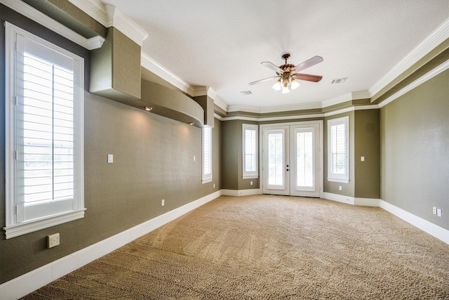 5925 Oak Leaf Ct, Conroe, TX 77304 - empty room featuring ceiling fan, baseboards, ornamental molding, light carpet, and french doors
