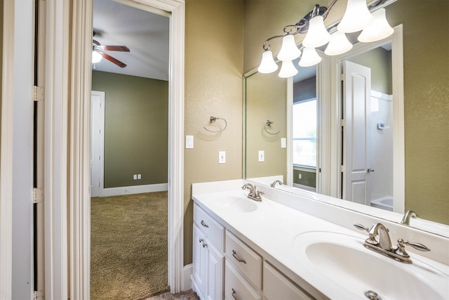 5925 Oak Leaf Ct, Conroe, TX 77304 - full bathroom featuring double vanity, a chandelier, and a ceiling fan