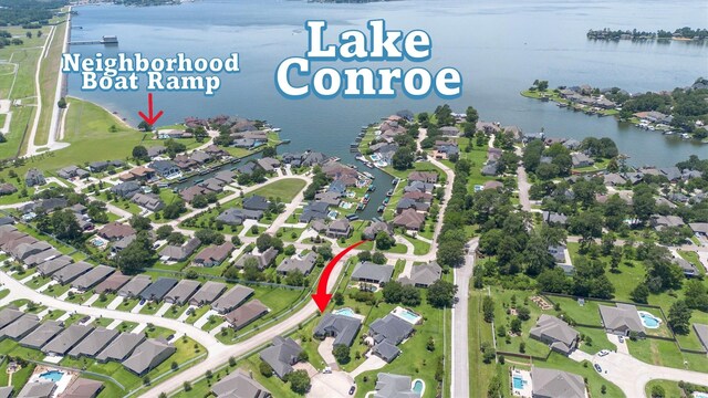5925 Oak Leaf Ct, Conroe, TX 77304 - aerial overview of property's location with nearby suburban area