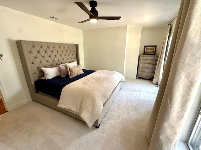 11219 Lorton Dr, Houston, TX 77070 - bedroom with light colored carpet, baseboards, and ceiling fan