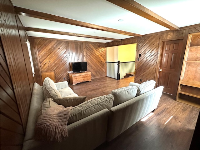 11219 Lorton Dr, Houston, TX 77070 - living area with wood walls, beamed ceiling, and wood finished floors