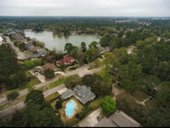 11219 Lorton Dr, Houston, TX 77070 - aerial overview of property's location with a nearby body of water and a pool