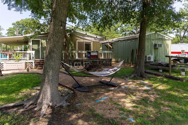 712 Birch Hollow Dr, Somerville, TX 77879 - rear view of property with a deck
