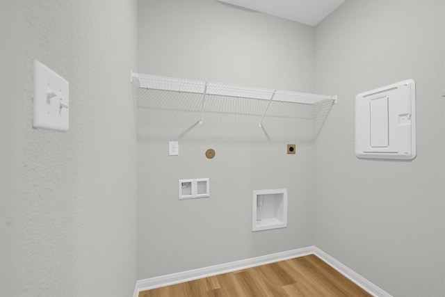 22807 Gentle Shadow Dr, Hockley, TX 77447 - laundry room featuring electric dryer hookup, wood finished floors, baseboards, hookup for a washing machine, and electric panel