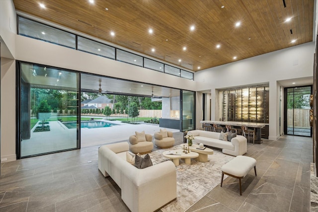 9010 Memorial Dr, Houston, TX 77024 - common area featuring wood ceiling, a towering ceiling, and recessed lighting