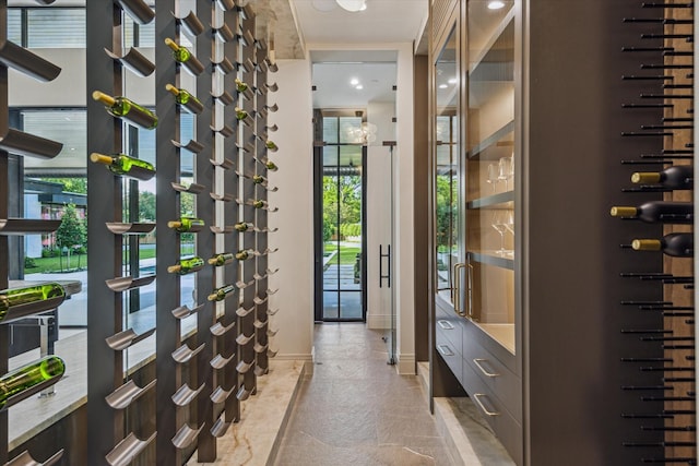 9010 Memorial Dr, Houston, TX 77024 - wine cellar featuring healthy amount of natural light and baseboards
