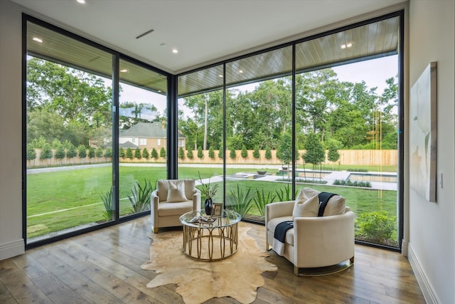 9010 Memorial Dr, Houston, TX 77024 - sunroom / solarium featuring view of wooded area