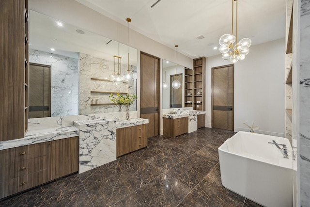 9010 Memorial Dr, Houston, TX 77024 - bathroom with marble tiled floors, two vanities, a freestanding bath, a chandelier, and built in shelves