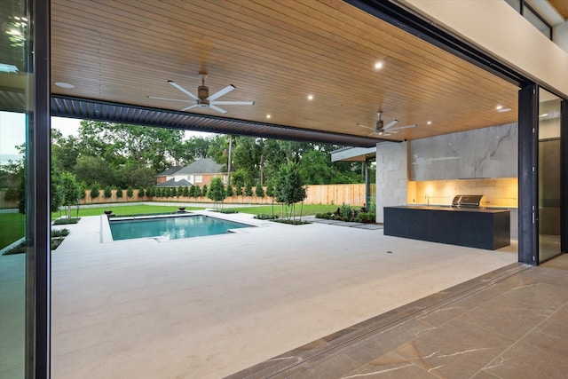 9010 Memorial Dr, Houston, TX 77024 - view of pool with an outdoor kitchen, ceiling fan, and a patio area