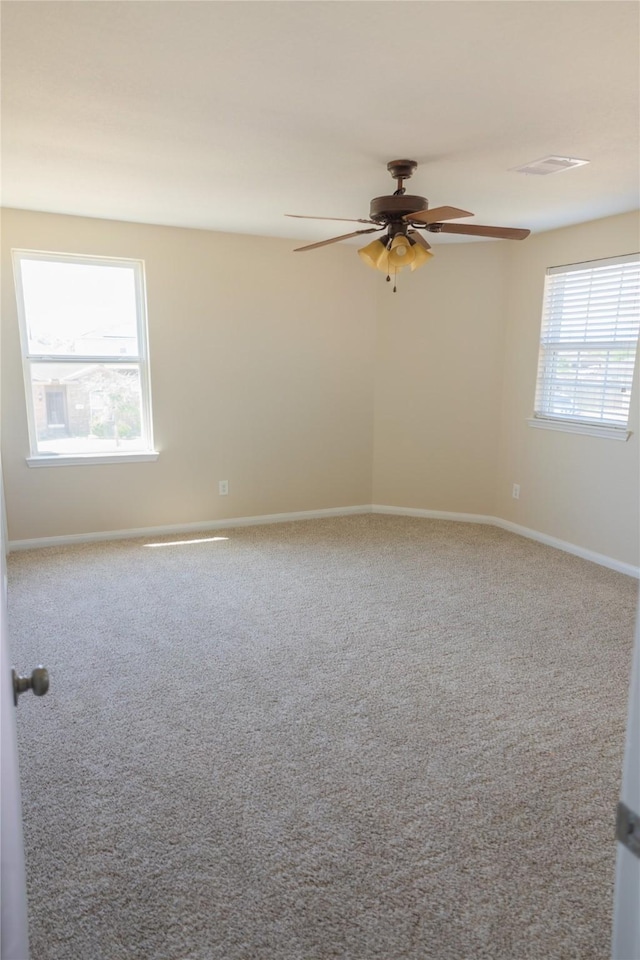 5123 Harbor Palm Dr, Rosenberg, TX 77469 - carpeted spare room featuring ceiling fan and baseboards