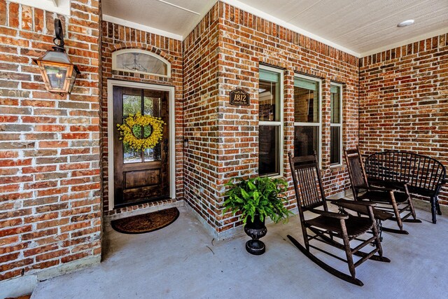 1812 Camellia Dr, Huntsville, TX 77340 - view of exterior entry with brick siding