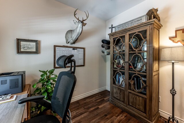 1812 Camellia Dr, Huntsville, TX 77340 - office space featuring dark wood-style floors and baseboards