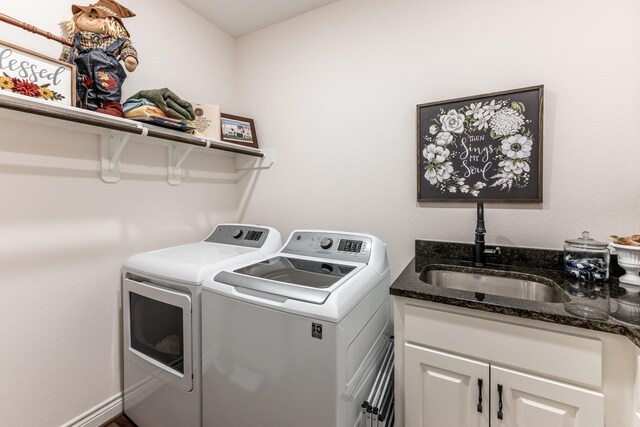 1812 Camellia Dr, Huntsville, TX 77340 - laundry room with washer and dryer and cabinet space