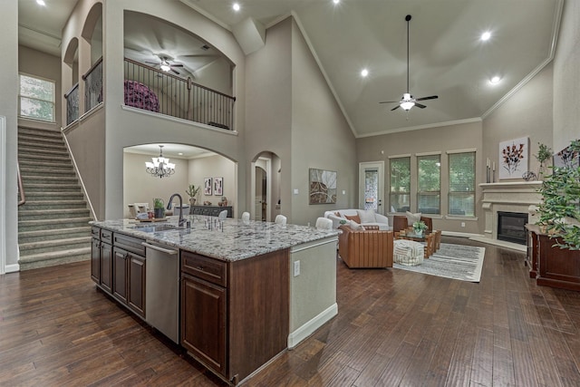 114 Cedar Brush Ct, Montgomery, TX 77316 - kitchen with a ceiling fan, a sink, stainless steel dishwasher, open floor plan, and high vaulted ceiling