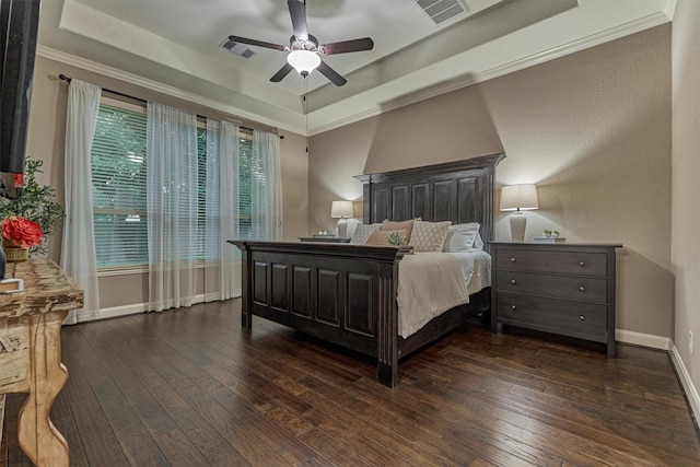 114 Cedar Brush Ct, Montgomery, TX 77316 - bedroom featuring a tray ceiling, hardwood / wood-style flooring, crown molding, baseboards, and a ceiling fan