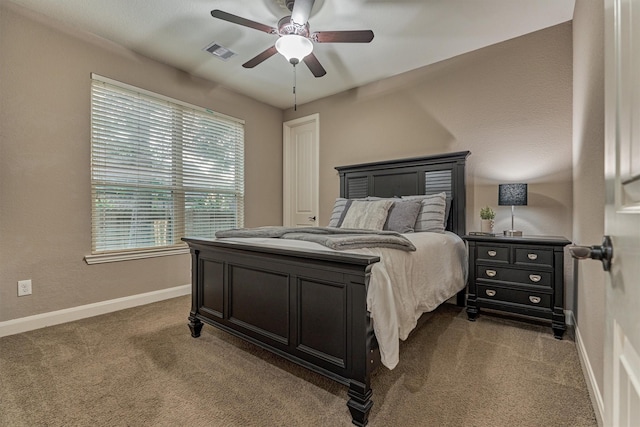 114 Cedar Brush Ct, Montgomery, TX 77316 - carpeted bedroom with baseboards and a ceiling fan