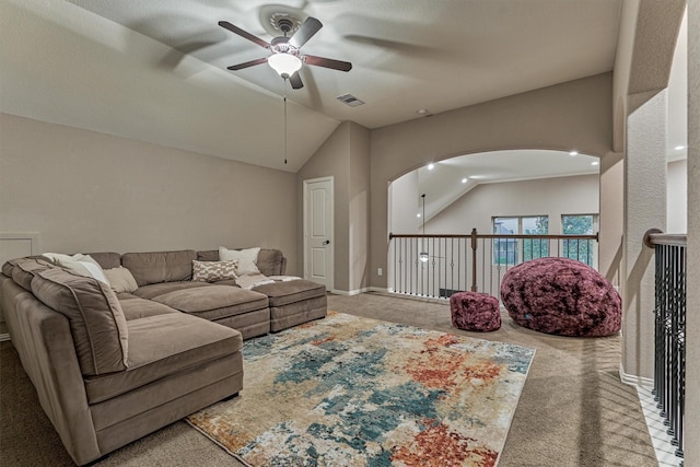 114 Cedar Brush Ct, Montgomery, TX 77316 - carpeted living area with a ceiling fan, lofted ceiling, and arched walkways