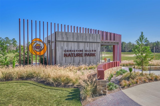 114 Cedar Brush Ct, Montgomery, TX 77316 - surrounding community featuring a lawn