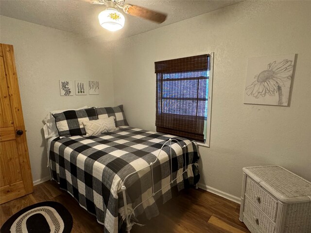 164 Pine Hollow Cv, Brookeland, TX 75931 - bedroom with wood finished floors and baseboards