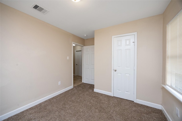 6319 Winfield Rd, Houston, TX 77050 - unfurnished bedroom with carpet floors and baseboards