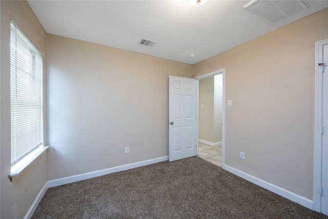 6319 Winfield Rd, Houston, TX 77050 - unfurnished bedroom with carpet flooring and baseboards