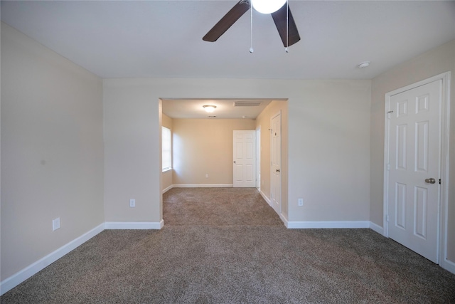 6319 Winfield Rd, Houston, TX 77050 - empty room with a ceiling fan, carpet, and baseboards