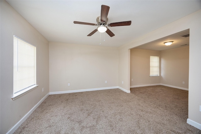 6319 Winfield Rd, Houston, TX 77050 - carpeted spare room with ceiling fan and baseboards