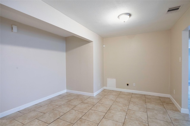 6319 Winfield Rd, Houston, TX 77050 - spare room featuring light tile patterned floors and baseboards