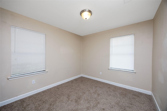 6319 Winfield Rd, Houston, TX 77050 - carpeted spare room with baseboards