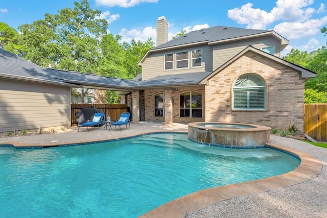 126 S Bluff Creek Cir, The Woodlands, TX 77382 - view of swimming pool featuring a patio area and a pool with connected hot tub