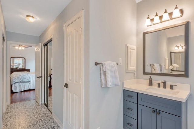 126 S Bluff Creek Cir, The Woodlands, TX 77382 - ensuite bathroom with vanity and baseboards