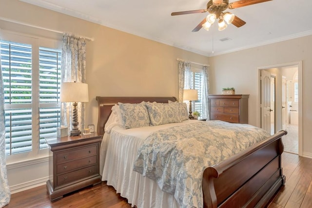 126 S Bluff Creek Cir, The Woodlands, TX 77382 - bedroom with wood finished floors, ornamental molding, and ceiling fan