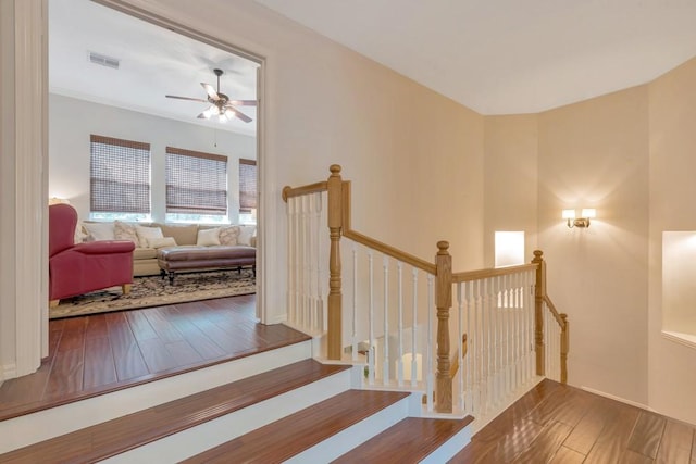 126 S Bluff Creek Cir, The Woodlands, TX 77382 - staircase featuring hardwood / wood-style floors and ceiling fan