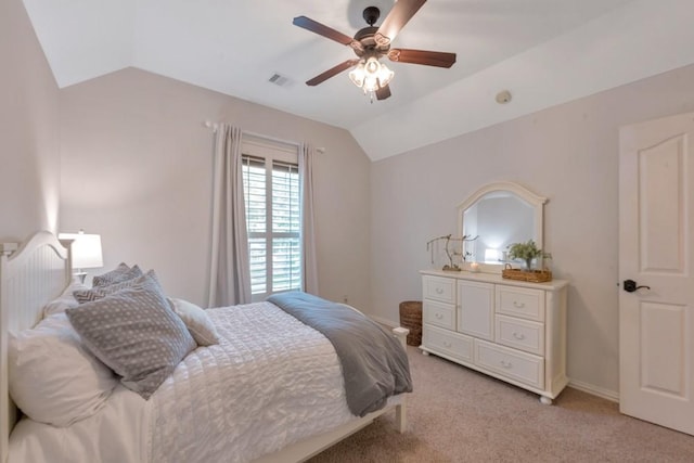 126 S Bluff Creek Cir, The Woodlands, TX 77382 - bedroom with vaulted ceiling, light colored carpet, and ceiling fan