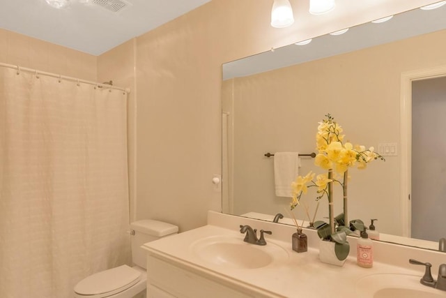 126 S Bluff Creek Cir, The Woodlands, TX 77382 - bathroom featuring double vanity and a shower with curtain
