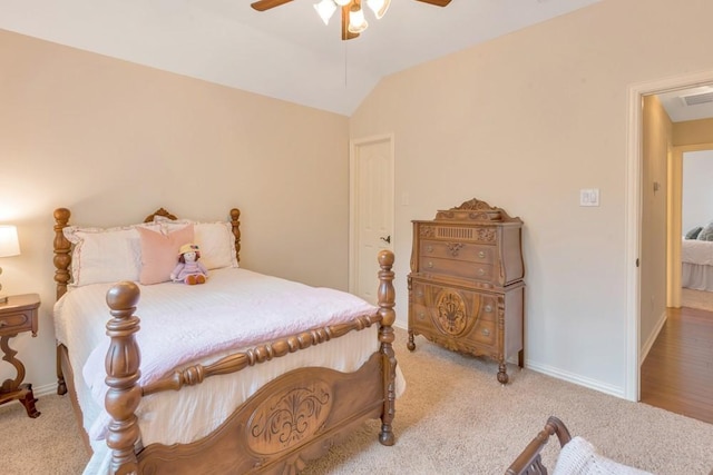 126 S Bluff Creek Cir, The Woodlands, TX 77382 - bedroom featuring light colored carpet, a ceiling fan, and vaulted ceiling