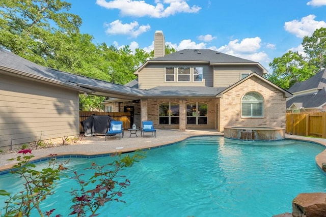 126 S Bluff Creek Cir, The Woodlands, TX 77382 - view of swimming pool featuring a patio, a fenced backyard, grilling area, and a pool with connected hot tub