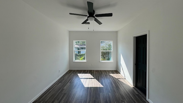 322 W Nazro St, Baytown, TX 77520 - unfurnished room with dark wood finished floors, baseboards, and ceiling fan