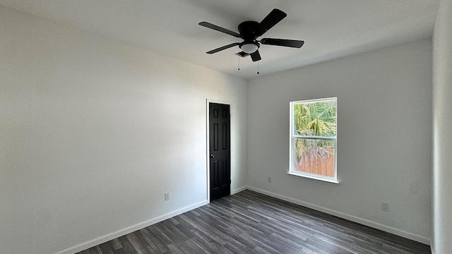 322 W Nazro St, Baytown, TX 77520 - unfurnished room featuring dark wood finished floors, baseboards, and a ceiling fan