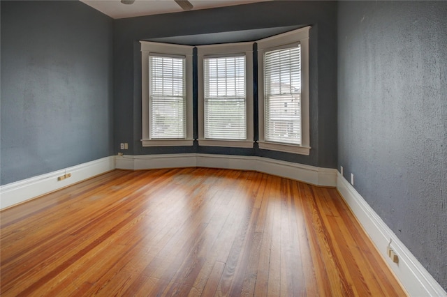 239 Westheimer Rd, Houston, TX 77006 - empty room featuring hardwood / wood-style floors and baseboards