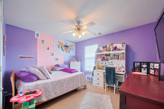 17810 Laurelton Dr, Humble, TX 77396 - bedroom with a textured ceiling, carpet flooring, and a ceiling fan