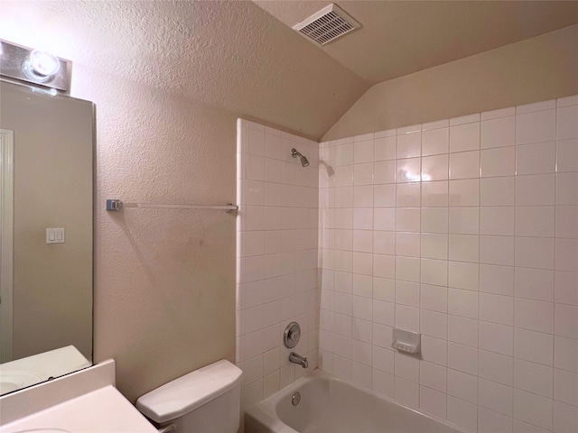 3822 Breckenridge Dr Unit X77356, Montgomery, TX 77356 - bathroom featuring bathtub / shower combination, toilet, vanity, vaulted ceiling, and a textured wall